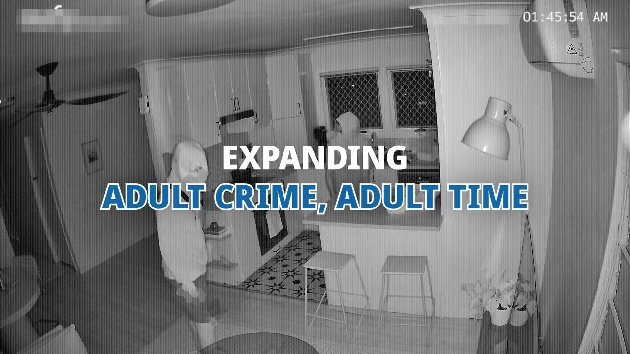Night-vision footage of hooded figures in a family kitchen, overlaid with the words Expanding Adult Crime, Adult Time